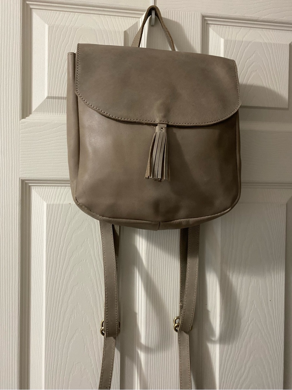 Raven + Lily Taupe Leather Backpack with Tassel Detail